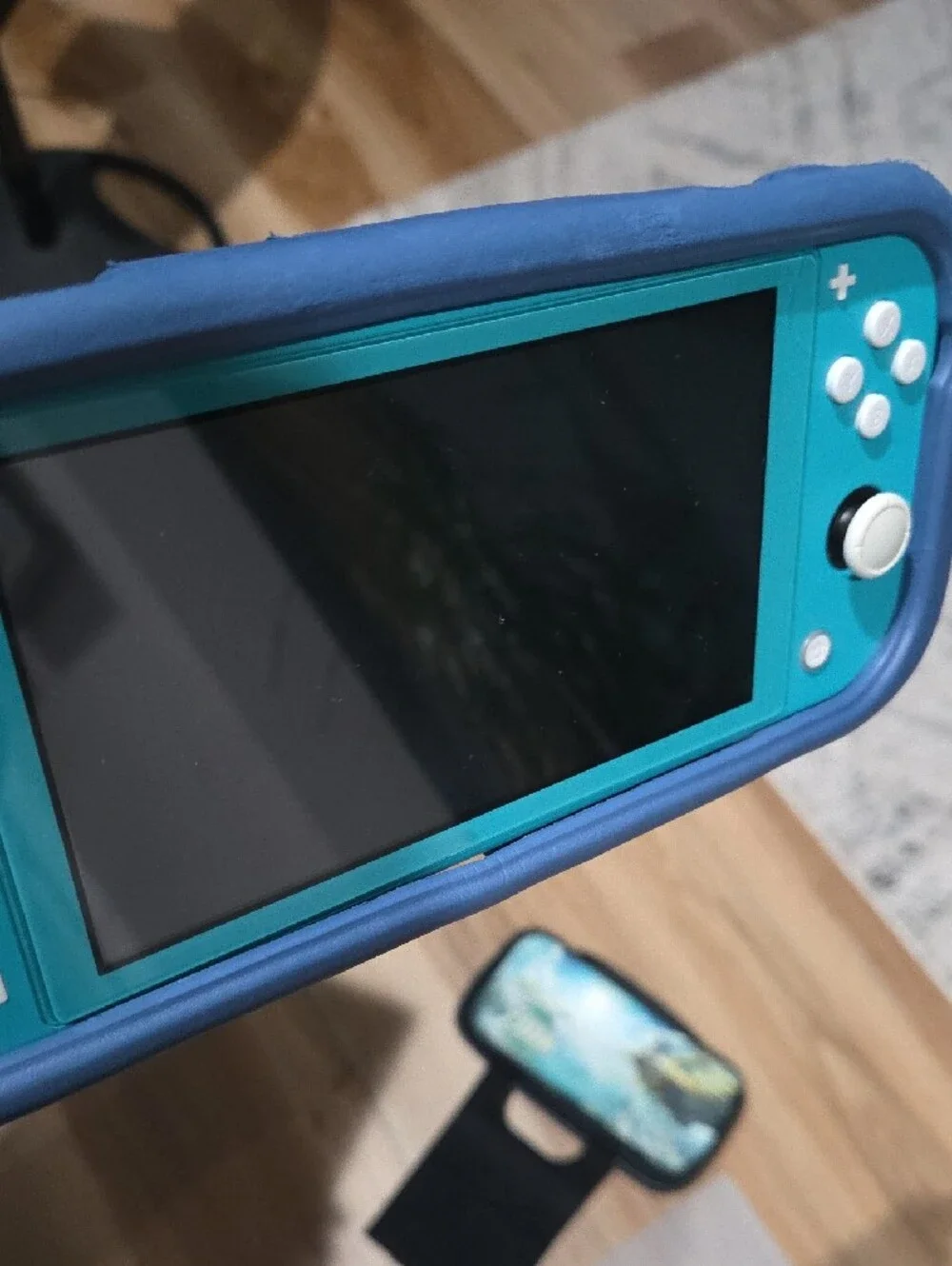 Nintendo Switch Lite Turquoise with Zelda Carry Case and Game Bundle